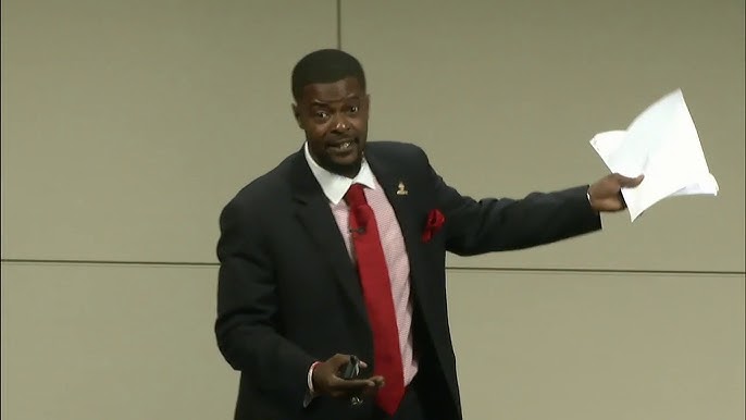tabari wallace holding paper